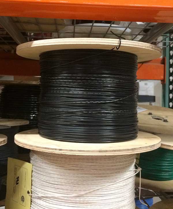 Photo of UL1007-26-7 hook up wire in warehouse.