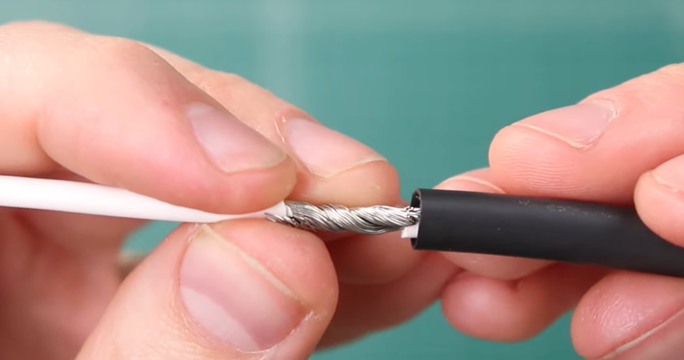 Cover wire splice with heat shrink tubing